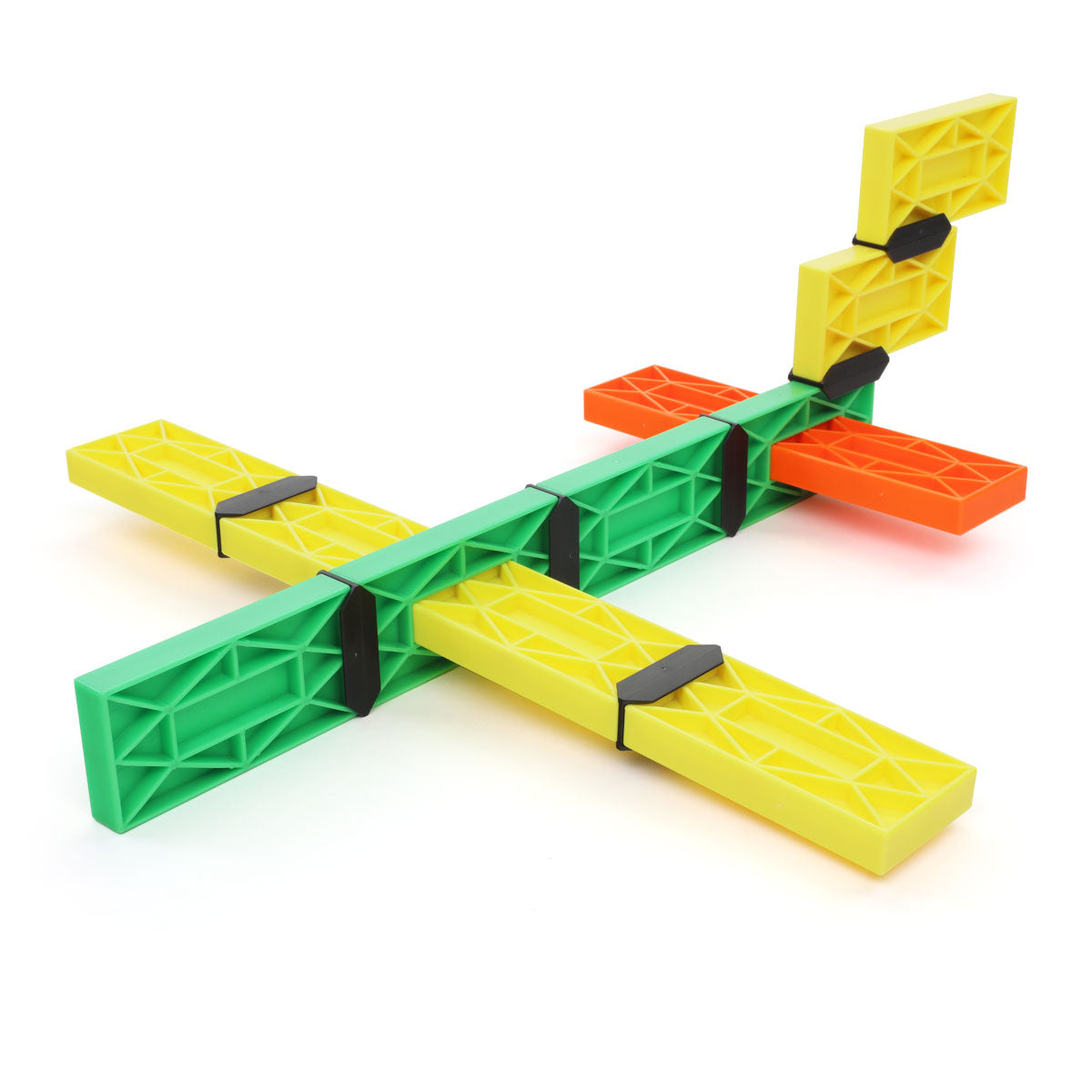 Airplane built from green, yellow, and orange Blokix interlocking building blocks forming wings and a tail, an open-ended STEAM building toy from Atwood Toys