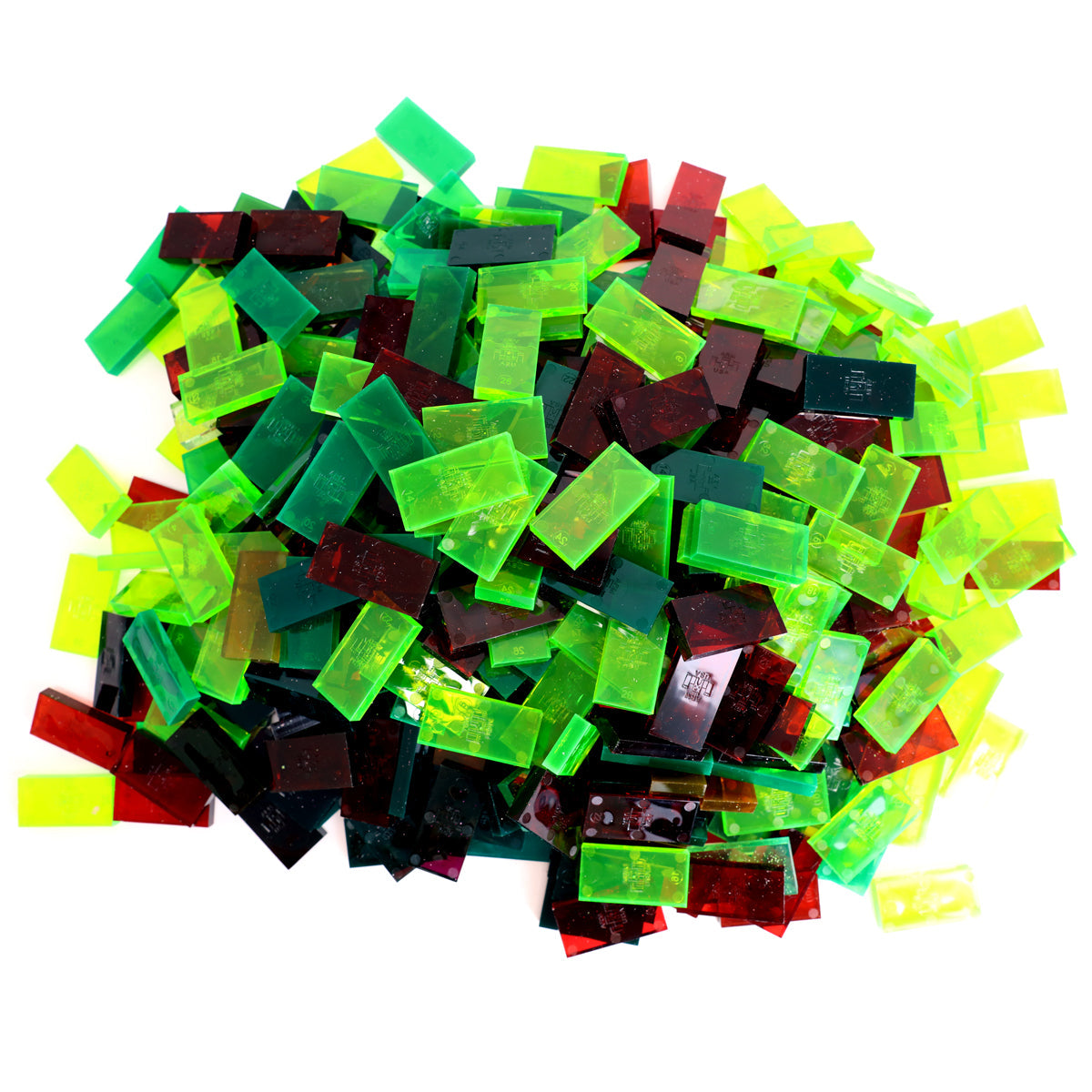 Bulk Dominoes closeout dominoes pile showing a translucent color lot with clear green, neon yellow, and dark red Pro Dominoes