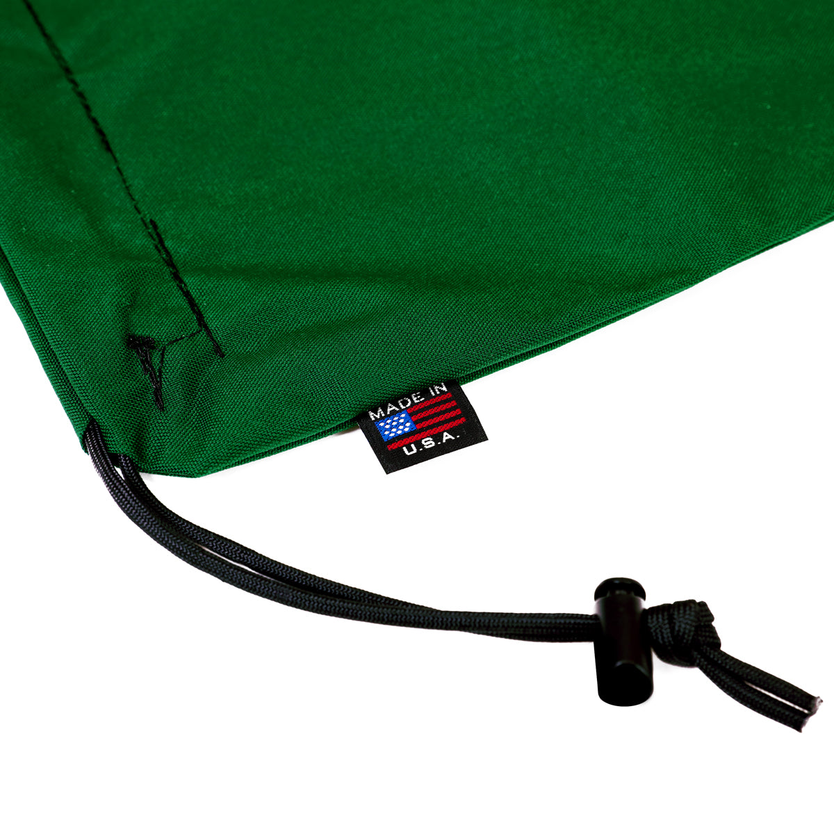 Bulk Dominoes Racing Green canvas storage bag close-up showing drawstring cord lock and Made in USA tag