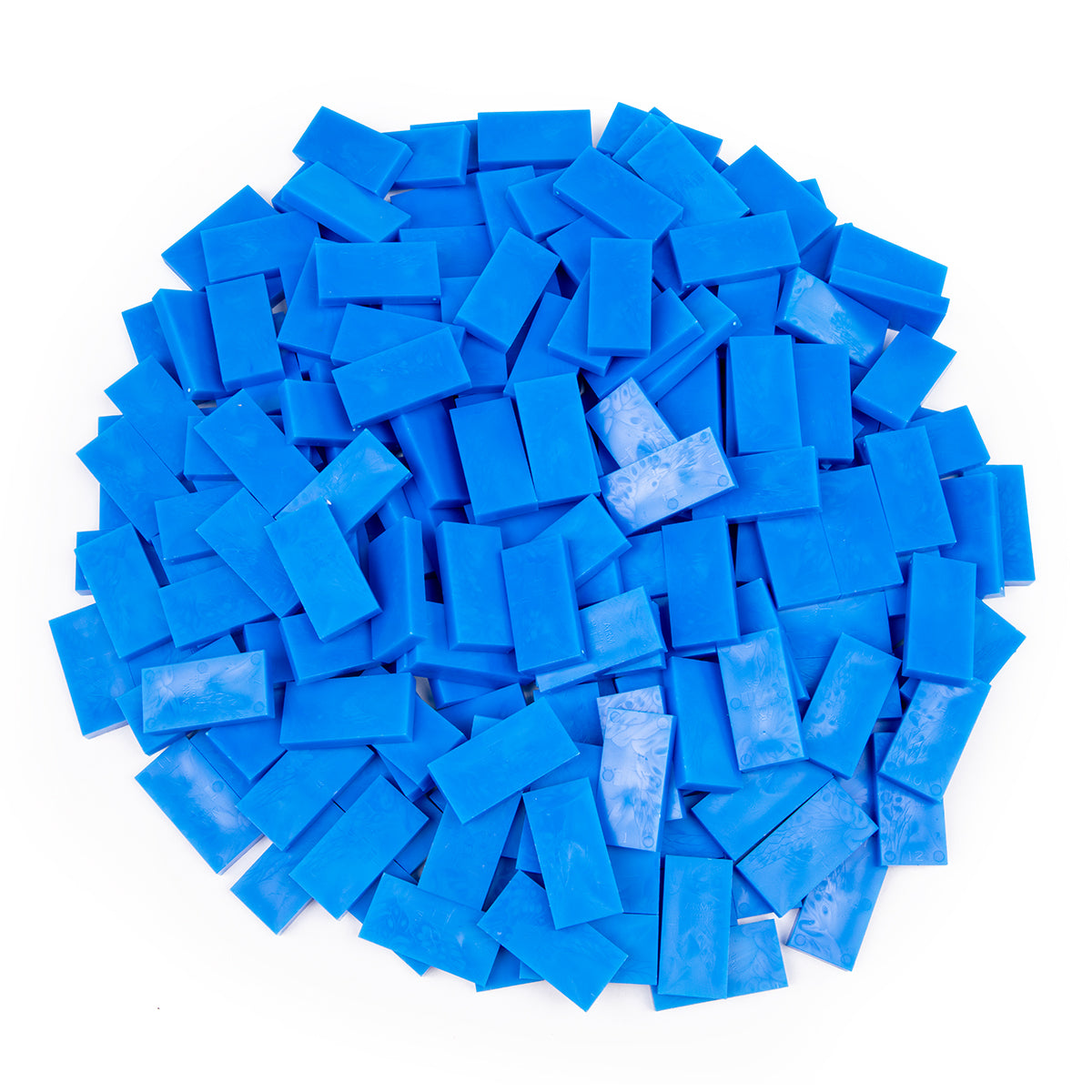 Bulk Dominoes Blue Pro Dominoes from Atwood Toys, a top-down pile of bright blue full-weight toppling dominoes for chain reactions and domino art.