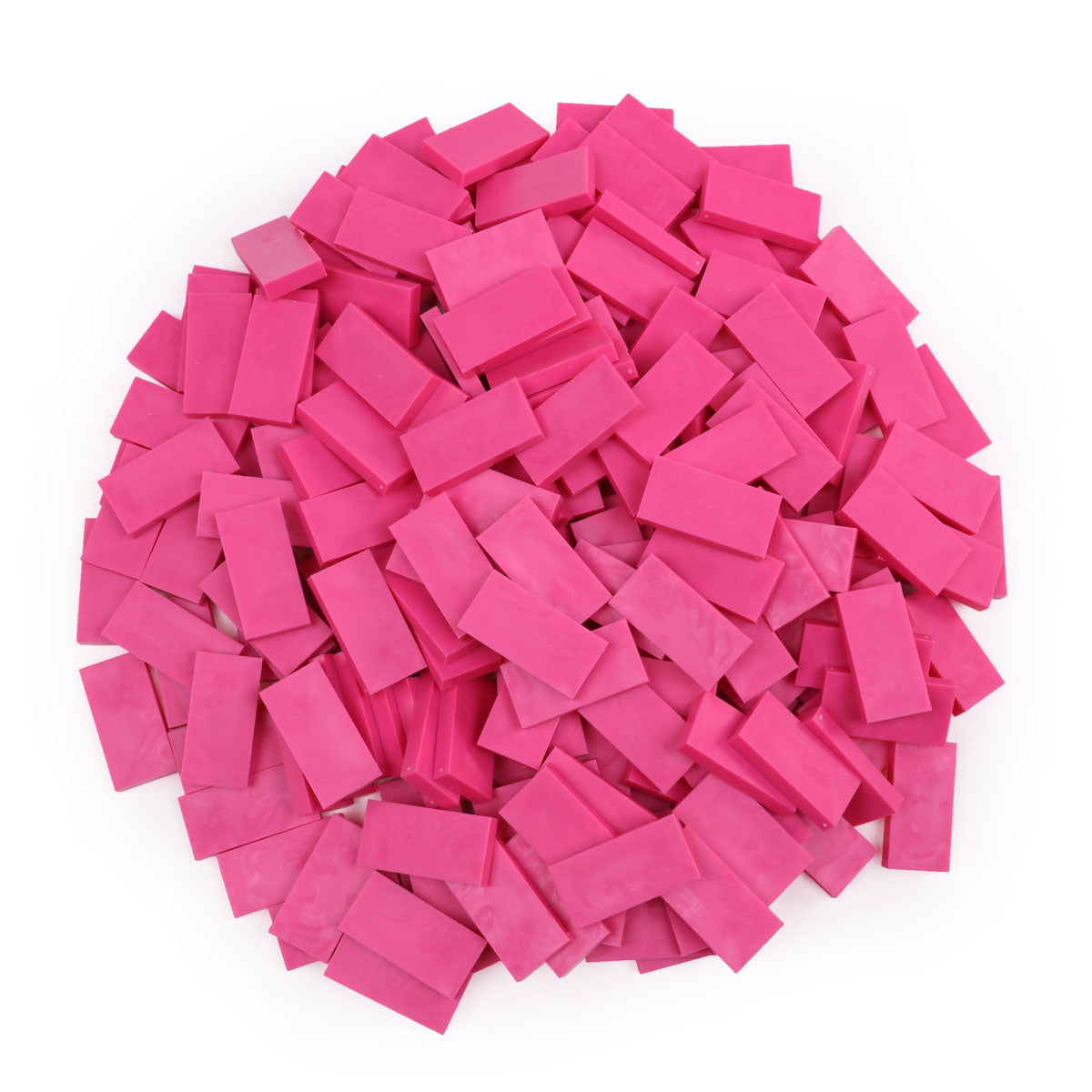 Bulk Dominoes Bubblegum Pink Pro Dominoes from Atwood Toys, a pile of bright pink full-weight toppling dominoes for chain reactions and domino art.