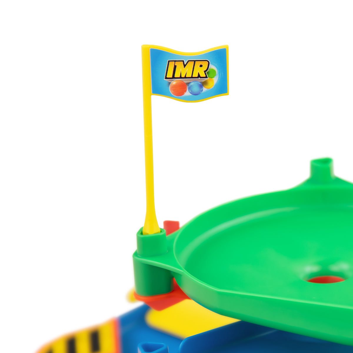 IMR Circuit Overdrive yellow flag with IMR logo mounted on green track section