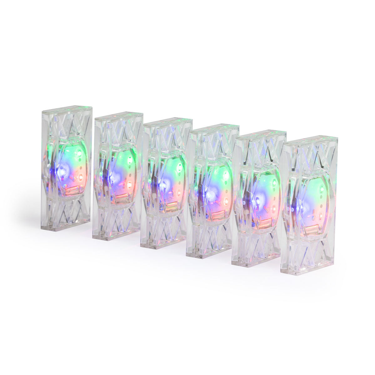 Light Up Electro Dominoes from Atwood Toys, a row of six clear toppling dominoes each glowing with a built-in red, green, and blue LED.