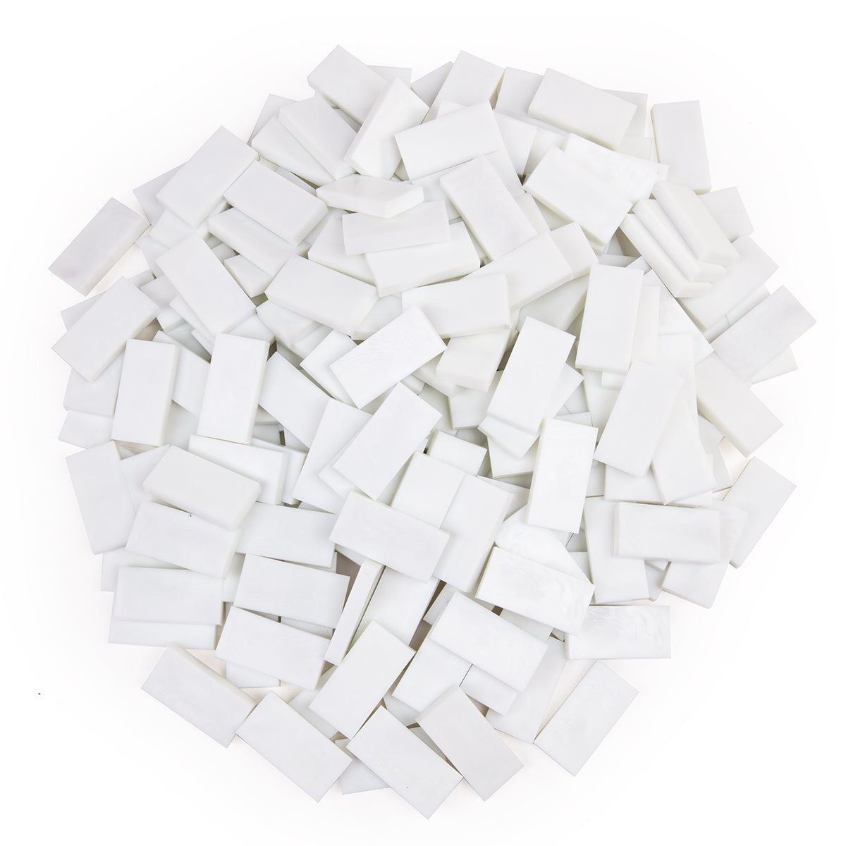 Bulk Dominoes Glow-in-the-Dark Pro Dominoes from Atwood Toys, a top-down pile of full-weight toppling dominoes glowing bright green in the dark for chain reactions and domino art.