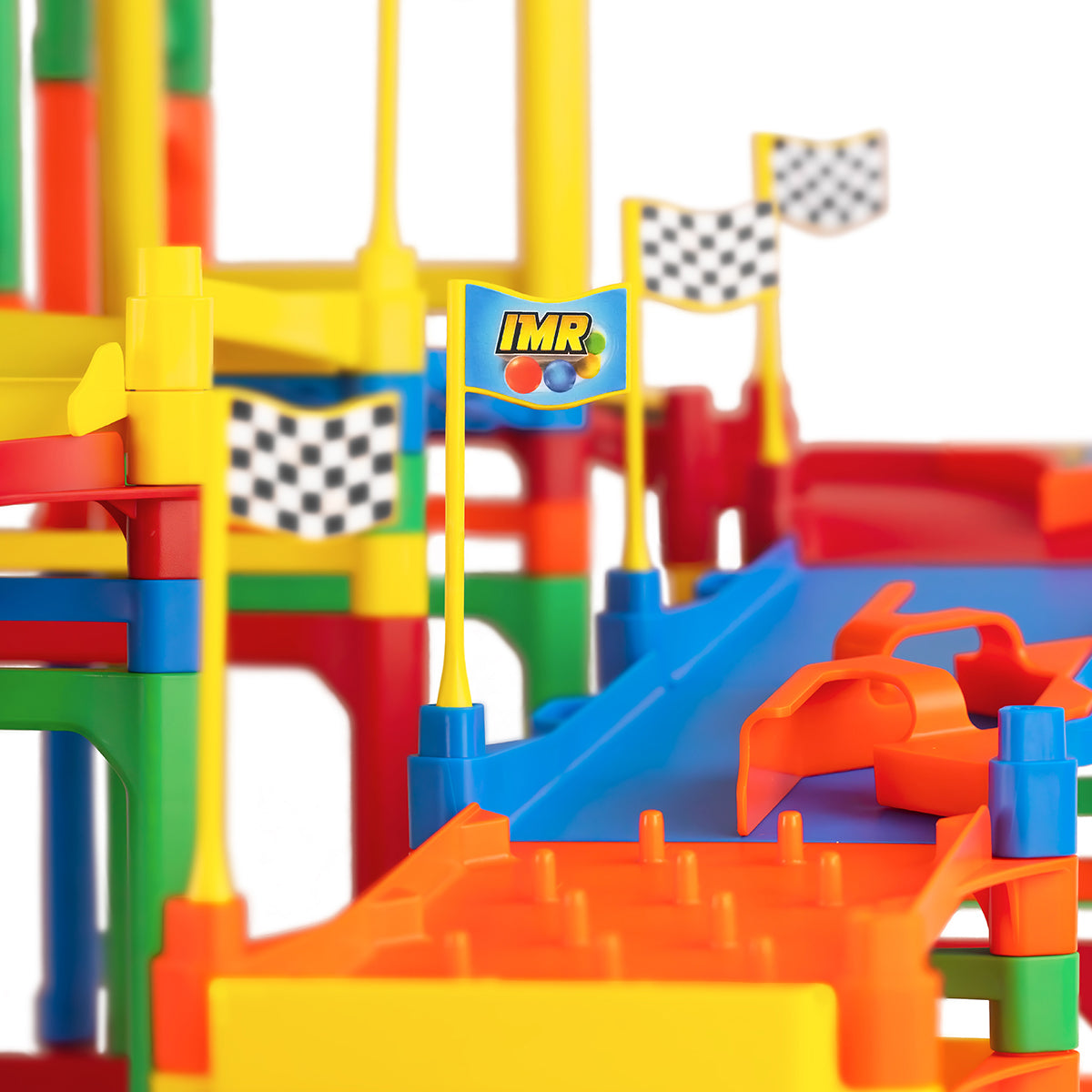 IMR Grand Prix Overdrive close-up of multi-level track with IMR flag, checkered flags, orange divider insert, and colorful lanes and support posts