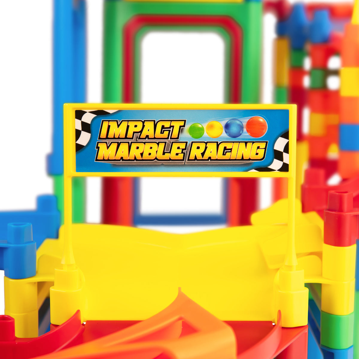 IMR Grand Prix Overdrive close-up of Impact Marble Racing branded banner sign mounted on colorful track with yellow bumper section below
