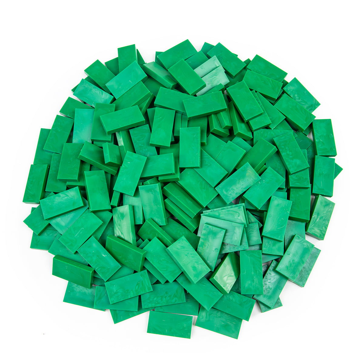 Bulk Dominoes Green Pro Dominoes from Atwood Toys, a top-down pile of bright green full-weight toppling dominoes for chain reactions and domino art.