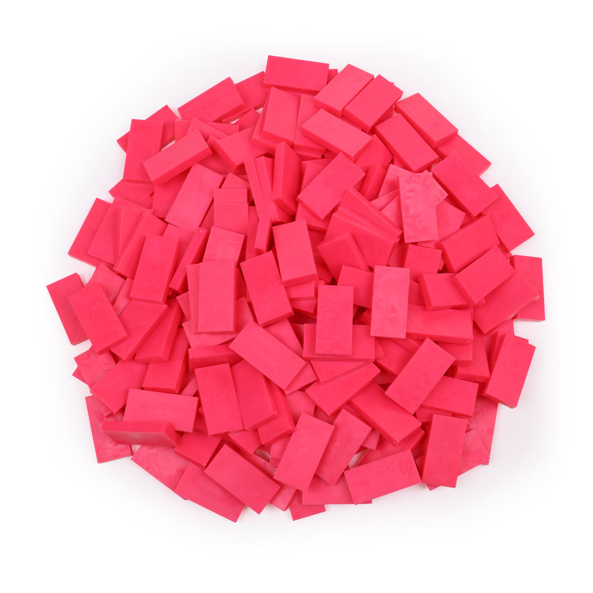 Bulk Dominoes Neon Pink Pro Dominoes from Atwood Toys, a top-down pile of bright neon pink full-weight toppling dominoes for chain reactions and domino art.