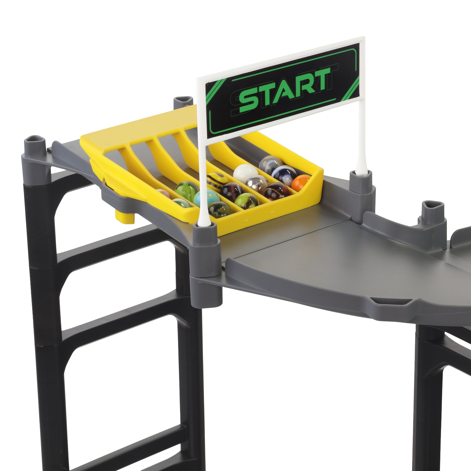 Jelle's M1 Hyper Loop close-up of yellow starting block with START banner, Jelle's official glass marbles loaded in lanes and ready to race