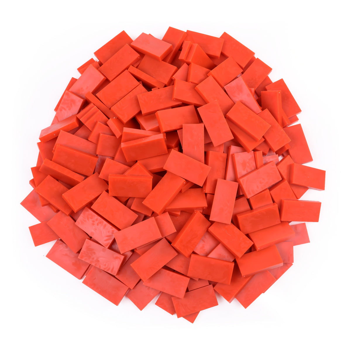 Bulk Dominoes Lava Orange Pro Dominoes from Atwood Toys, a pile of bright orange full-weight toppling dominoes for chain reactions and domino art.