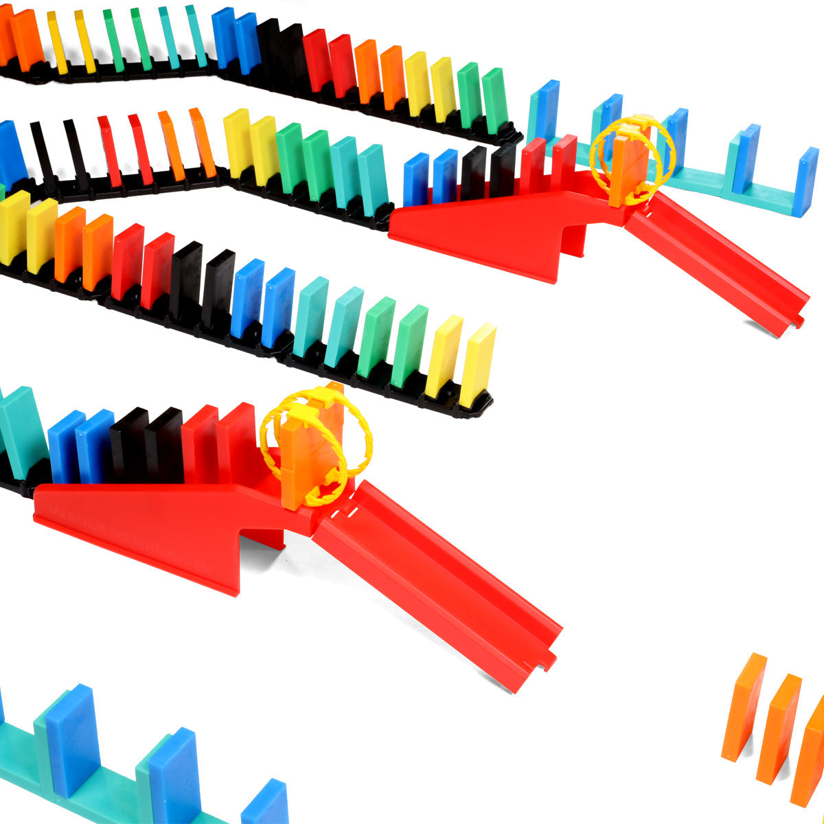 Atwood Toys Bulk Dominoes Rapid Track Kit close-up of two yellow rolling Domino Arcs on red bridges with multi-color dominoes lined up in black Rapid Track sections