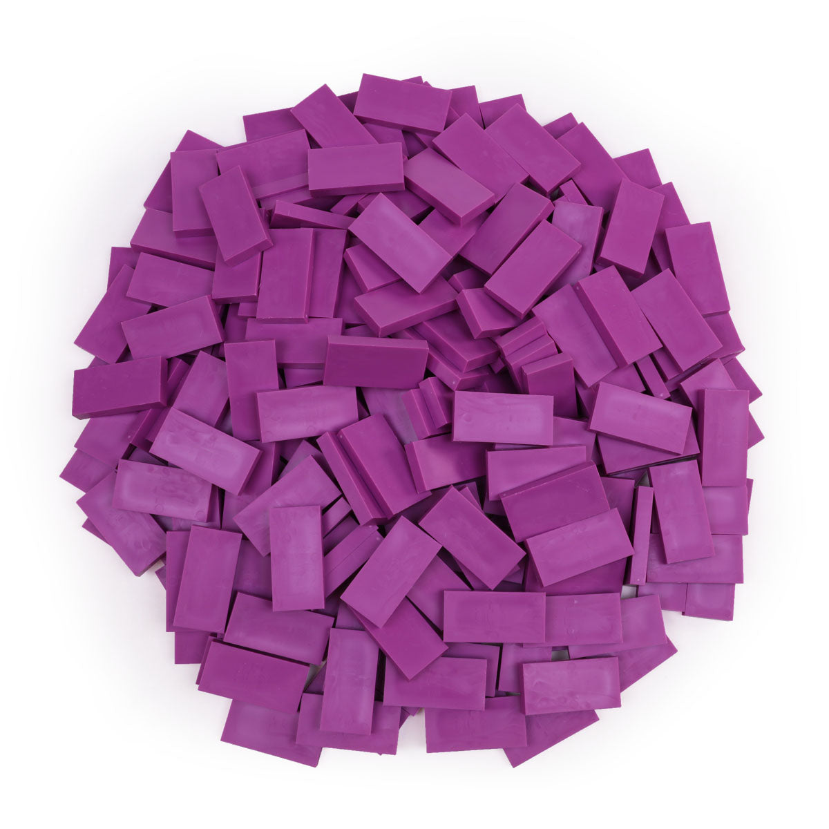 Bulk Dominoes Raspberry Pro Dominoes from Atwood Toys, a pile of deep raspberry purple full-weight toppling dominoes for chain reactions and domino art.