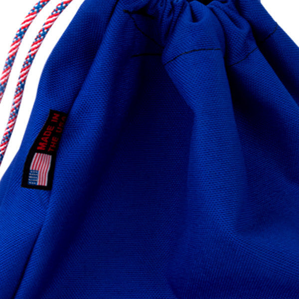 Bulk Dominoes Blue canvas storage bag close-up showing drawstring closure and Made in USA tag