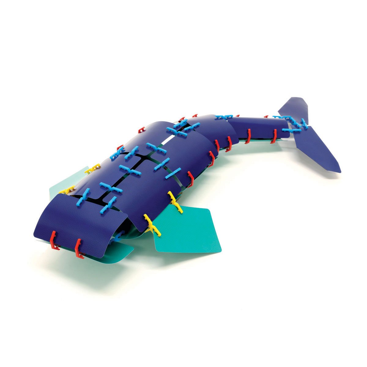 A navy-blue whale with teal fins built from playing cards linked by red, blue, and yellow Card Clips connectors into a 3D structure.