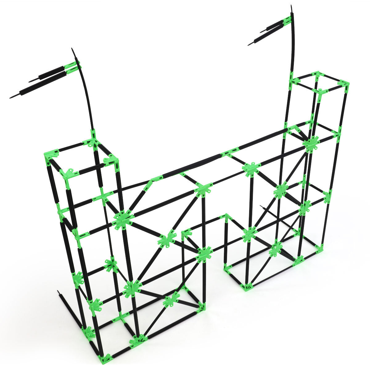 A castle gate built with Inventix, featuring two tall rectangular towers with flag-like rods at the top, connected by an arched bridge section with diagonal cross-bracing throughout.