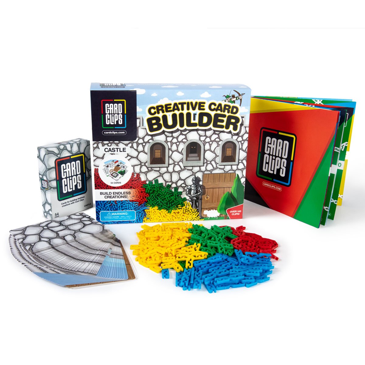 Creative Card Builder Castle set from Atwood Toys, the retail box with a stone-print building card deck and piles of red, green, yellow, and blue Card Clips connectors for assembling cards into towers and castles.
