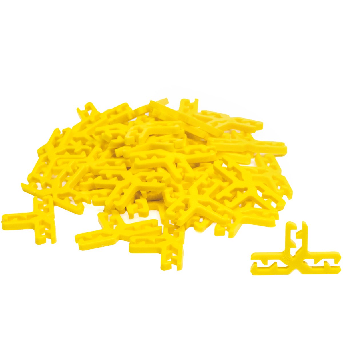 A pile of yellow plastic 3-way Card Clips connectors from Atwood Toys, the T-shaped clips that link trading and playing cards into towers, bridges, and 3D structures.