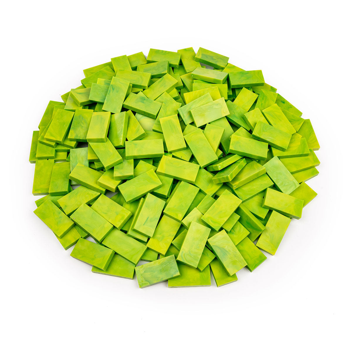 Bulk Dominoes Acid Storm Pro Dominoes from Atwood Toys, a top-down pile of marbled lime and yellow-green full-weight toppling dominoes for chain reactions and domino art.