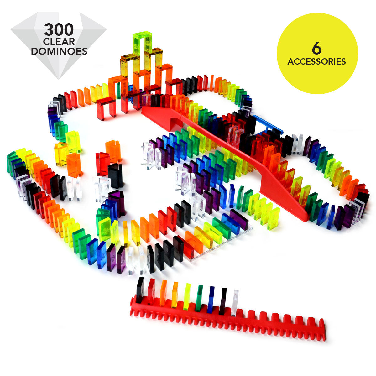 Bulk Dominoes Artisan Kit complete setup with 300 clear dominoes and 6 accessories badge overlay showing domino chain reaction with bridge, tower, and straight track
