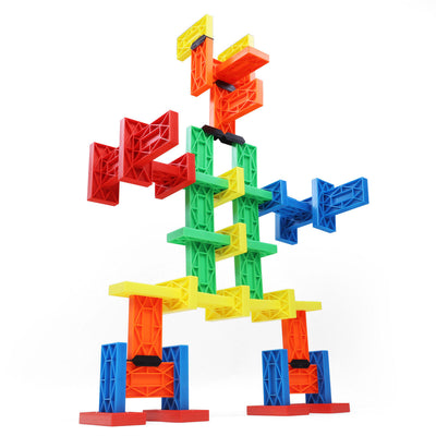 Standing robot figure built from green, red, yellow, orange, and blue Blokix interlocking building blocks, an open-ended STEAM building toy from Atwood Toys