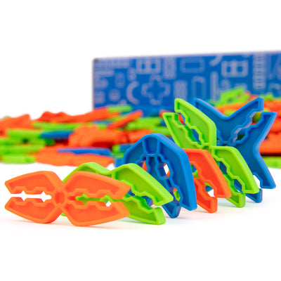 Box Lox Party Pack multi-color cardboard clips stood on edge in front of the blue bulk connectors box showing straight, V-shape and X-shape connectors.