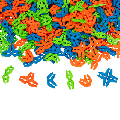 Six Box Lox Party Pack clip types lined up below a pile of multi-color cardboard building clips, including straight, V-shape and X-shape connectors.