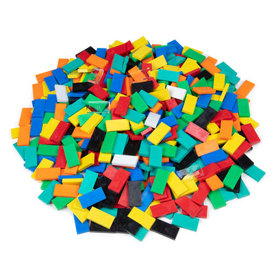 Atwood Toys Bulk Dominoes Classic Mix, multi-color toppling dominoes in red, blue, yellow, green, orange, black, white, and teal piled together for stacking, toppling, and domino art