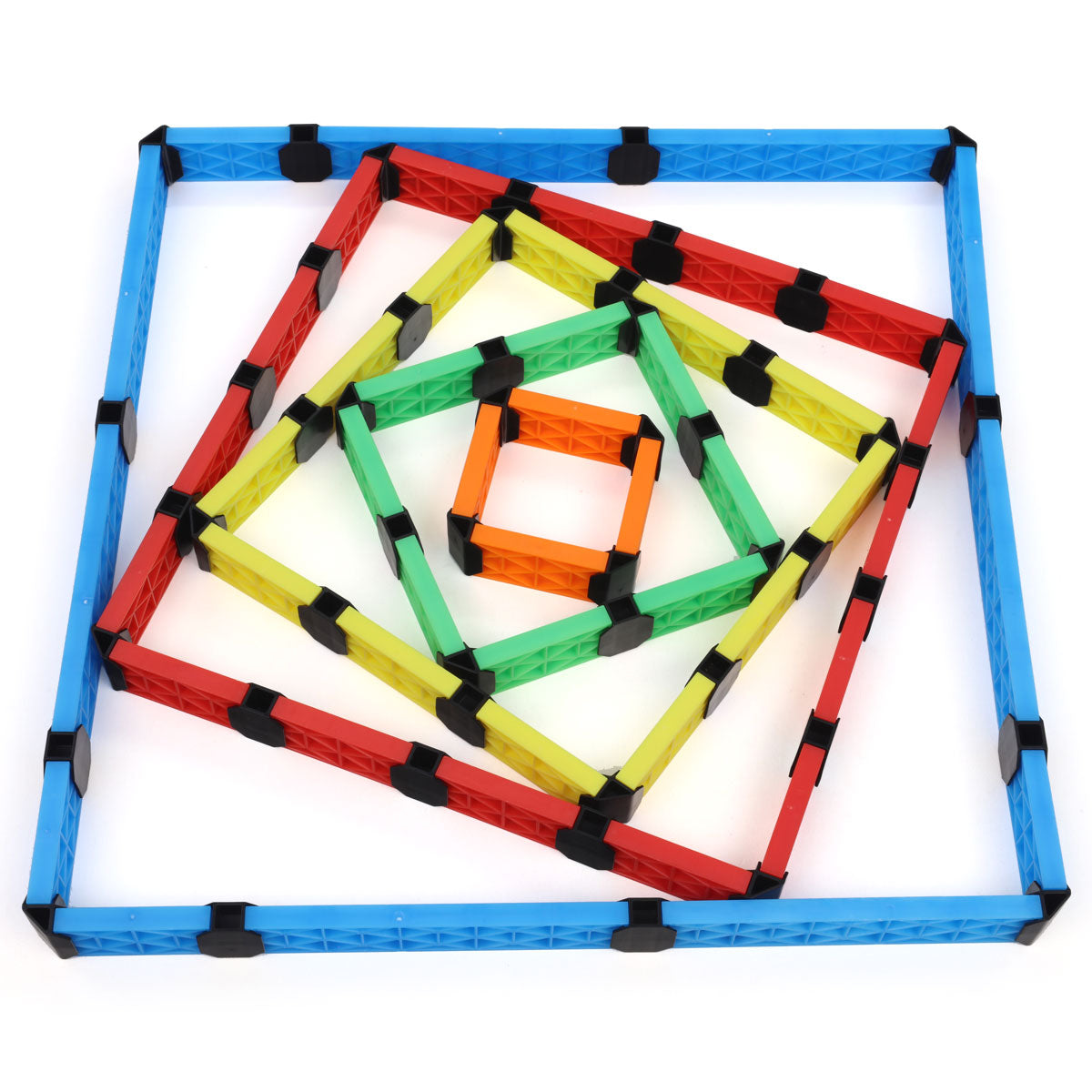 Concentric squares built from Atwood Toys Constructix Creative Explorer planks in blue, red, yellow, green, and orange, demonstrating geometric building patterns and STEM design
