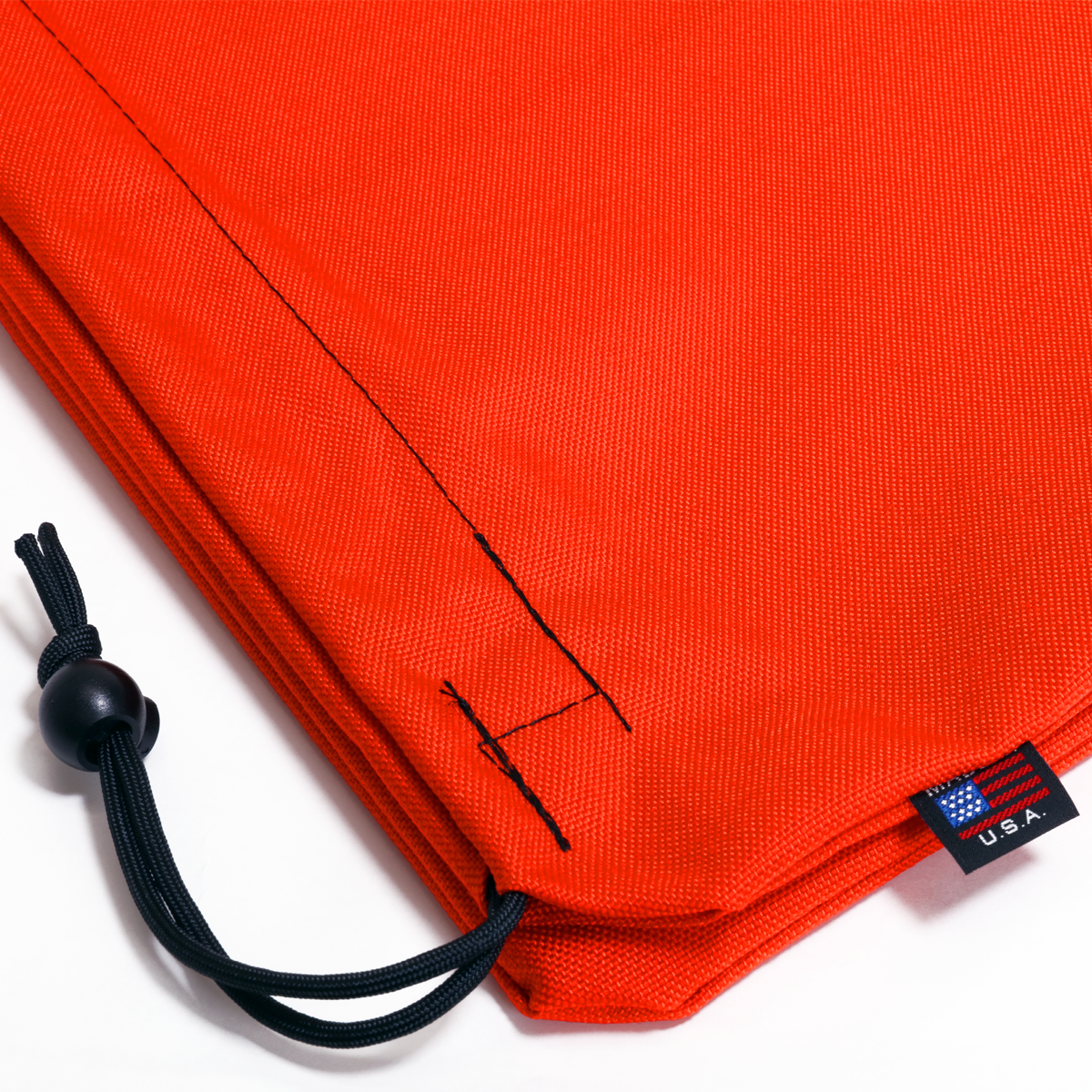 Bulk Dominoes Blood Dragon canvas storage bag close-up showing drawstring cord lock and Made in USA tag