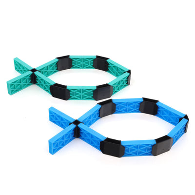 Two fish shapes built from the Atwood Toys Constructix Creative Explorer set, one in teal and one in blue, connected by black clips to demonstrate symbol-style builds
