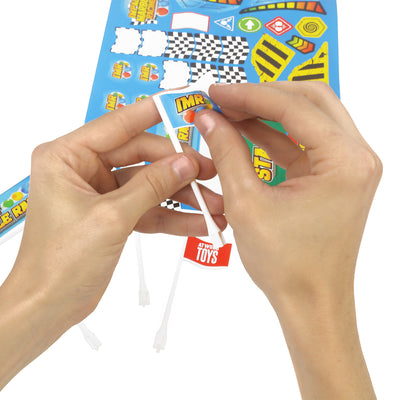 Hands applying Impact Marble Racing sticker to white flag pole from the Flags and Banners add-on pack