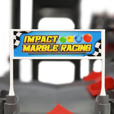 IMR Grand Prix Redline close-up of Impact Marble Racing branded banner sign mounted on track with blurred track in background