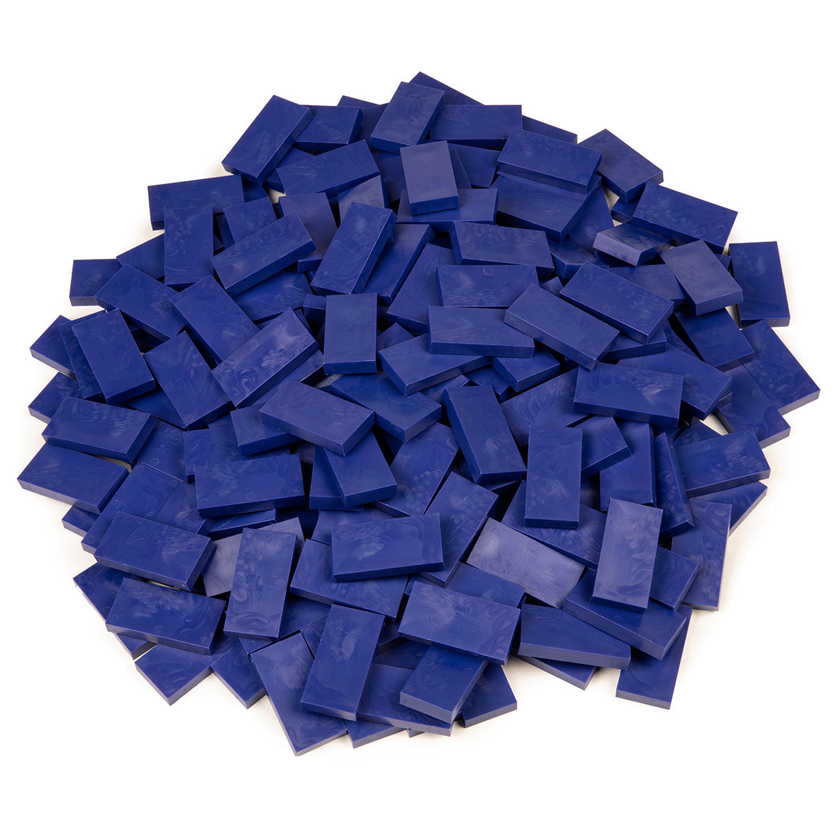 Bulk Dominoes Indigo Pro Dominoes from Atwood Toys, a pile of deep indigo blue full-weight toppling dominoes for chain reactions and domino art.