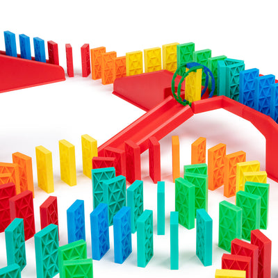 Atwood Toys Bulk Dominoes 331 Piece Kinetic Domino Toppling Kit close-up of a red staircase bridge with rolling Domino Arc and multi-color Pro-Scale dominoes