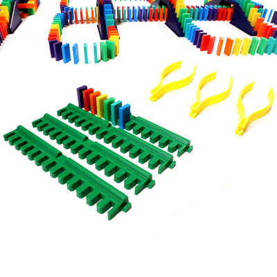 Bulk Dominoes Mini Master Kit accessories including green kinetic speed templates, yellow tweezers, and rainbow Mini Dominoes from Atwood Toys.