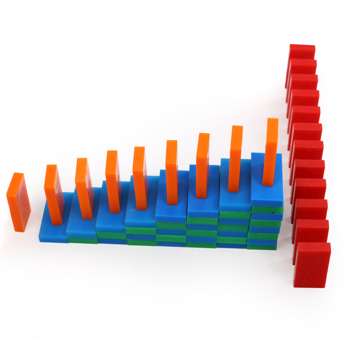 Rising staircase trick built from blue, green, orange, and red Bulk Dominoes Mini Dominoes, demonstrating advanced domino toppling techniques from the Mini Master Kit.