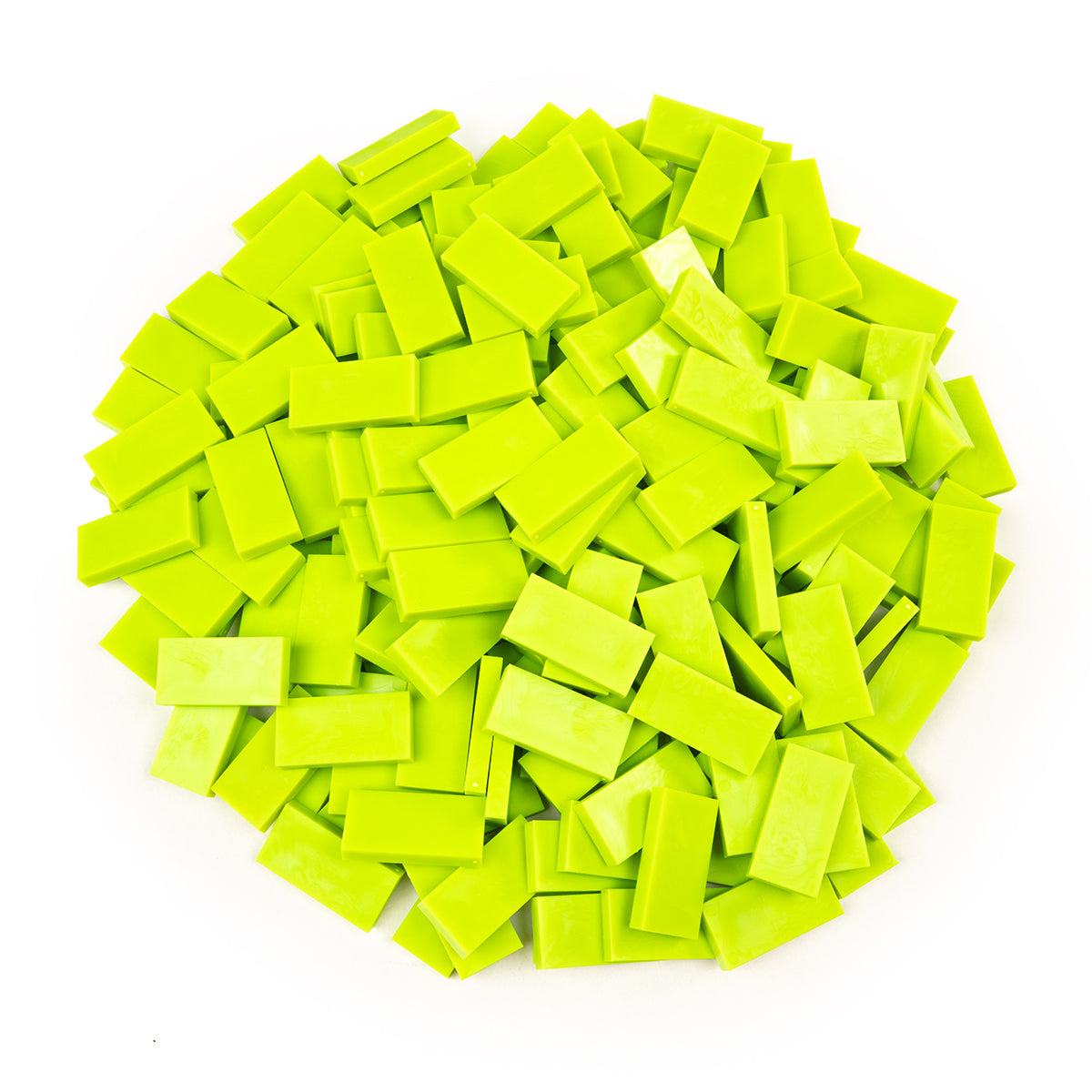 Bulk Dominoes Sour Apple Pro Dominoes from Atwood Toys, a pile of bright lime green full-weight toppling dominoes for chain reactions and domino art.