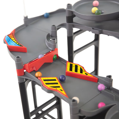 IMR Speedway Redline quick split section close-up with red lane dividers, yellow hazard inserts, and marbles navigating multiple paths