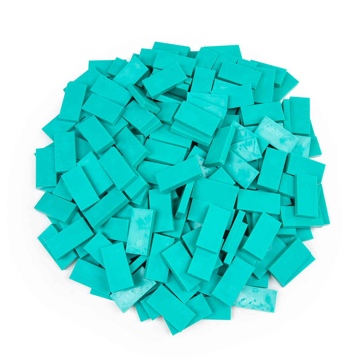 Bulk Dominoes Teal Pro Dominoes from Atwood Toys, a pile of bright teal full-weight toppling dominoes for chain reactions and domino art.