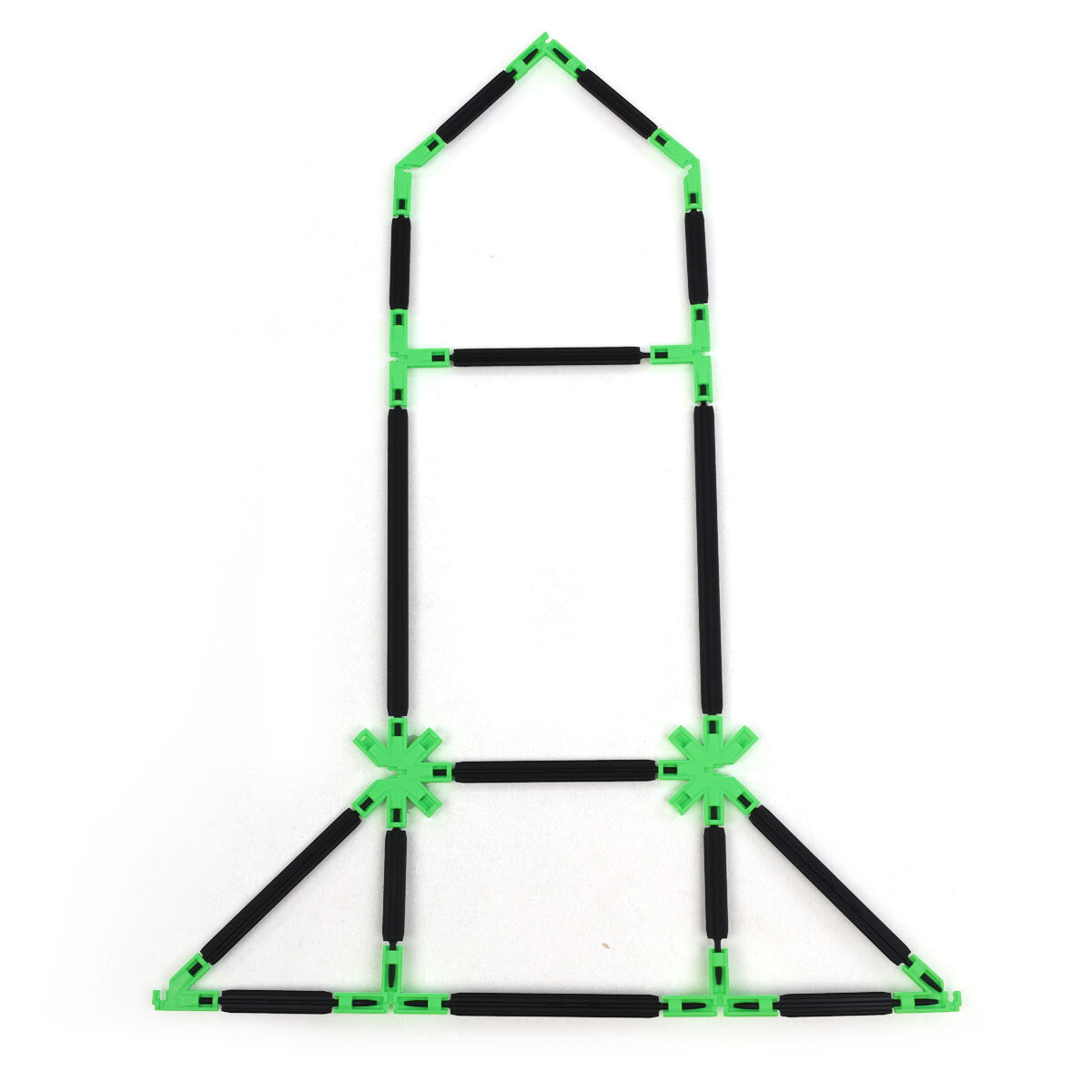 A flat 2D rocket outline built with Inventix, showing a pointed nose cone at the top, a rectangular body with horizontal crossbars, two green star connectors at the midsection, and a wide triangular base forming the fins and booster section.