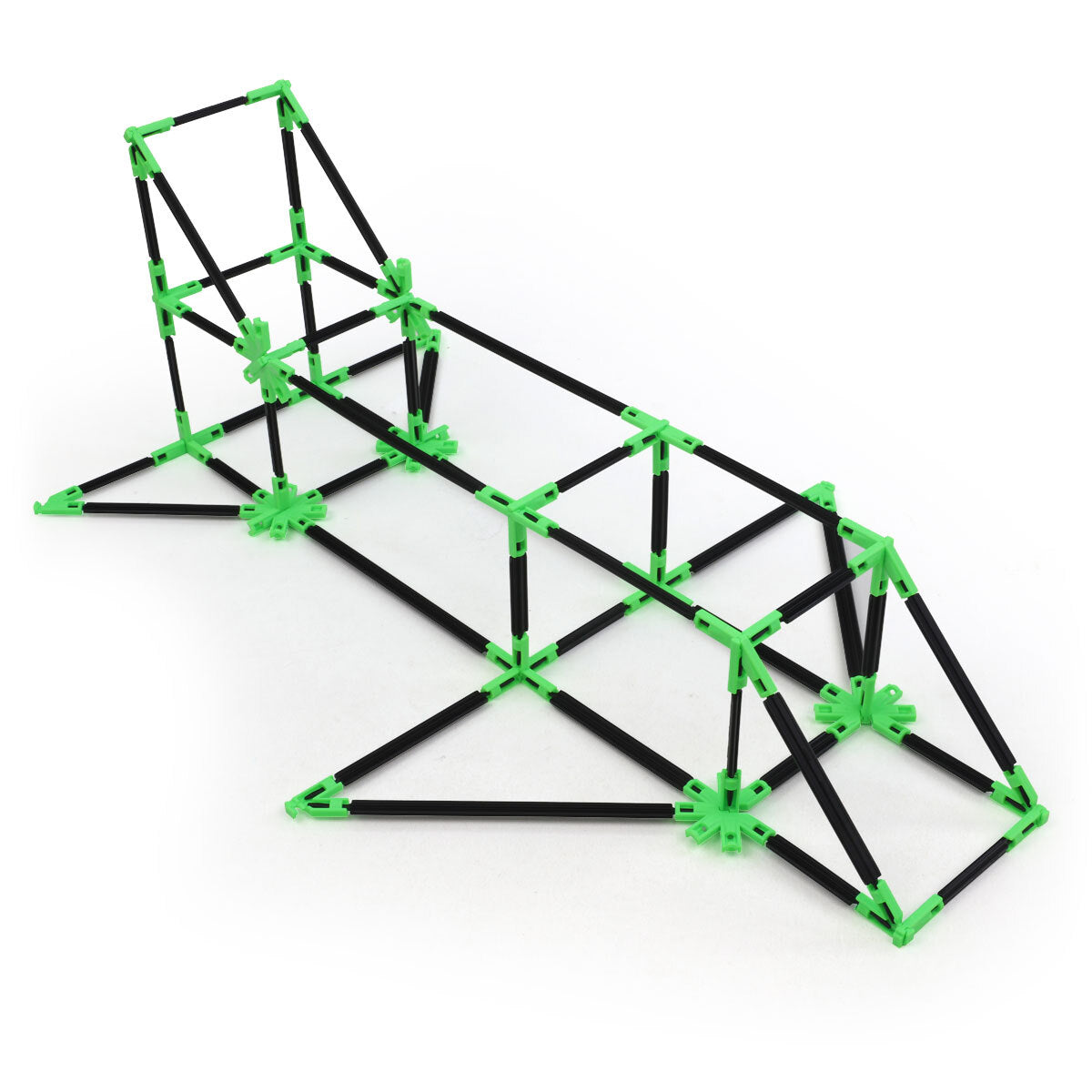 A spaceship built with Inventix, featuring an elongated angular frame with a raised cockpit section at one end, swept structural supports, and a tapered nose, made from black rods and green connectors.